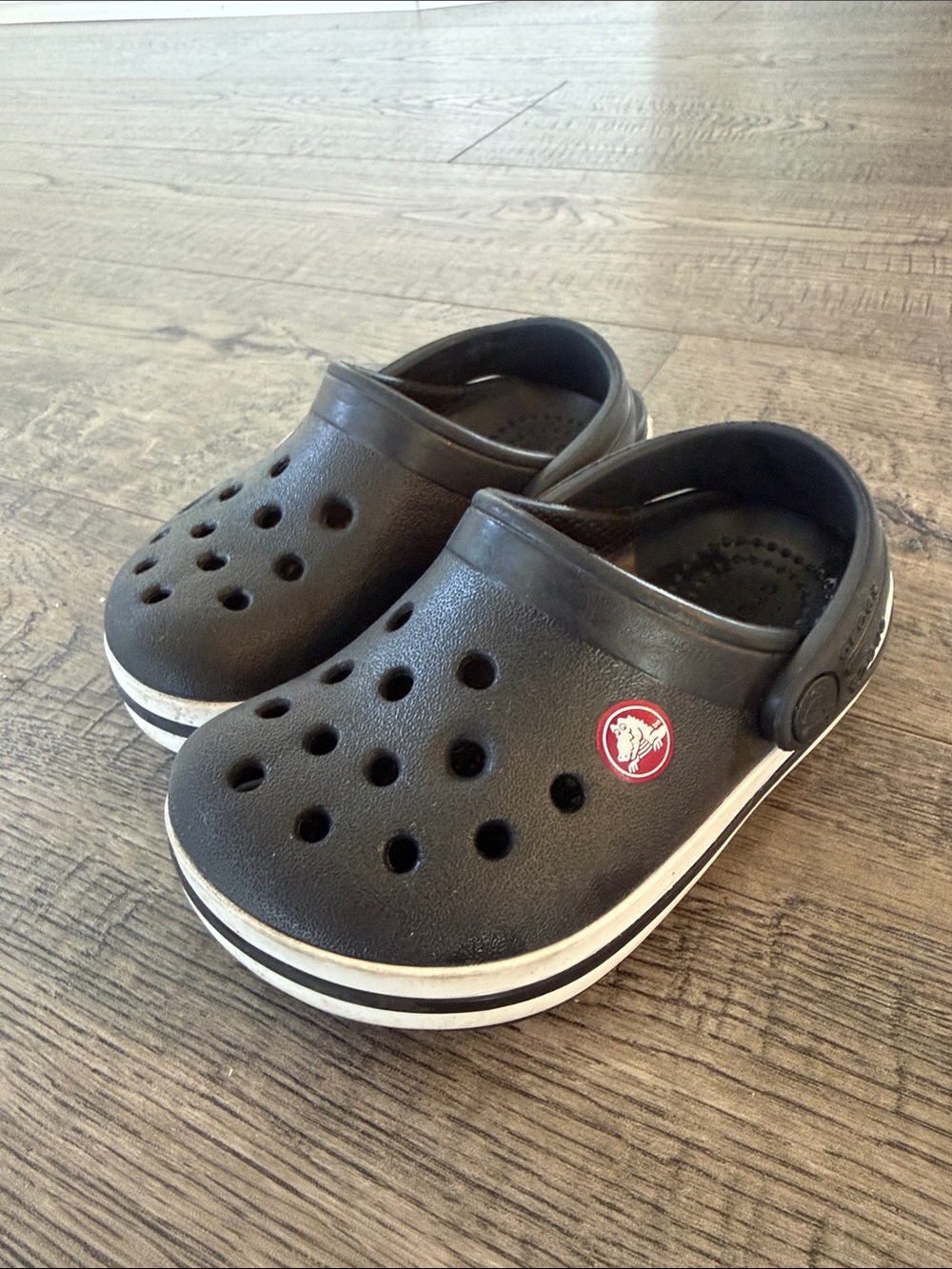 CROCS Kids Black Clog with White Trim and Red Logo